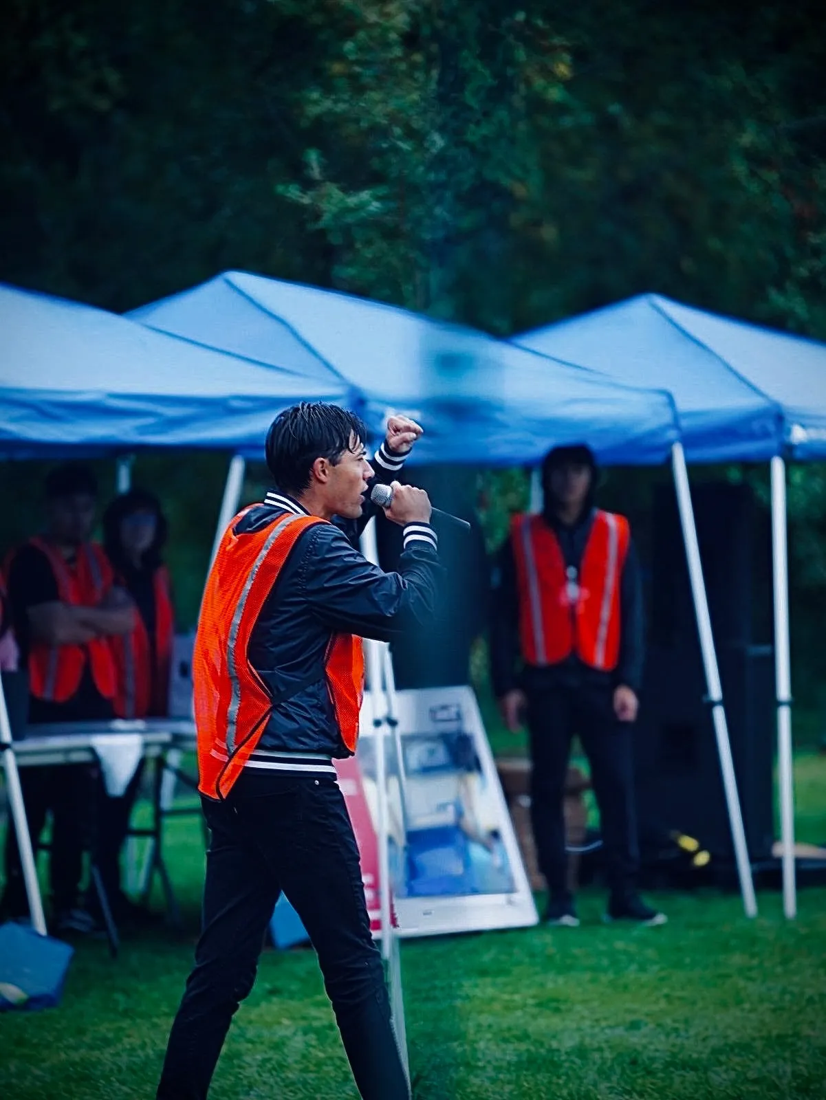 Joshua preaching at an outdoor crusade