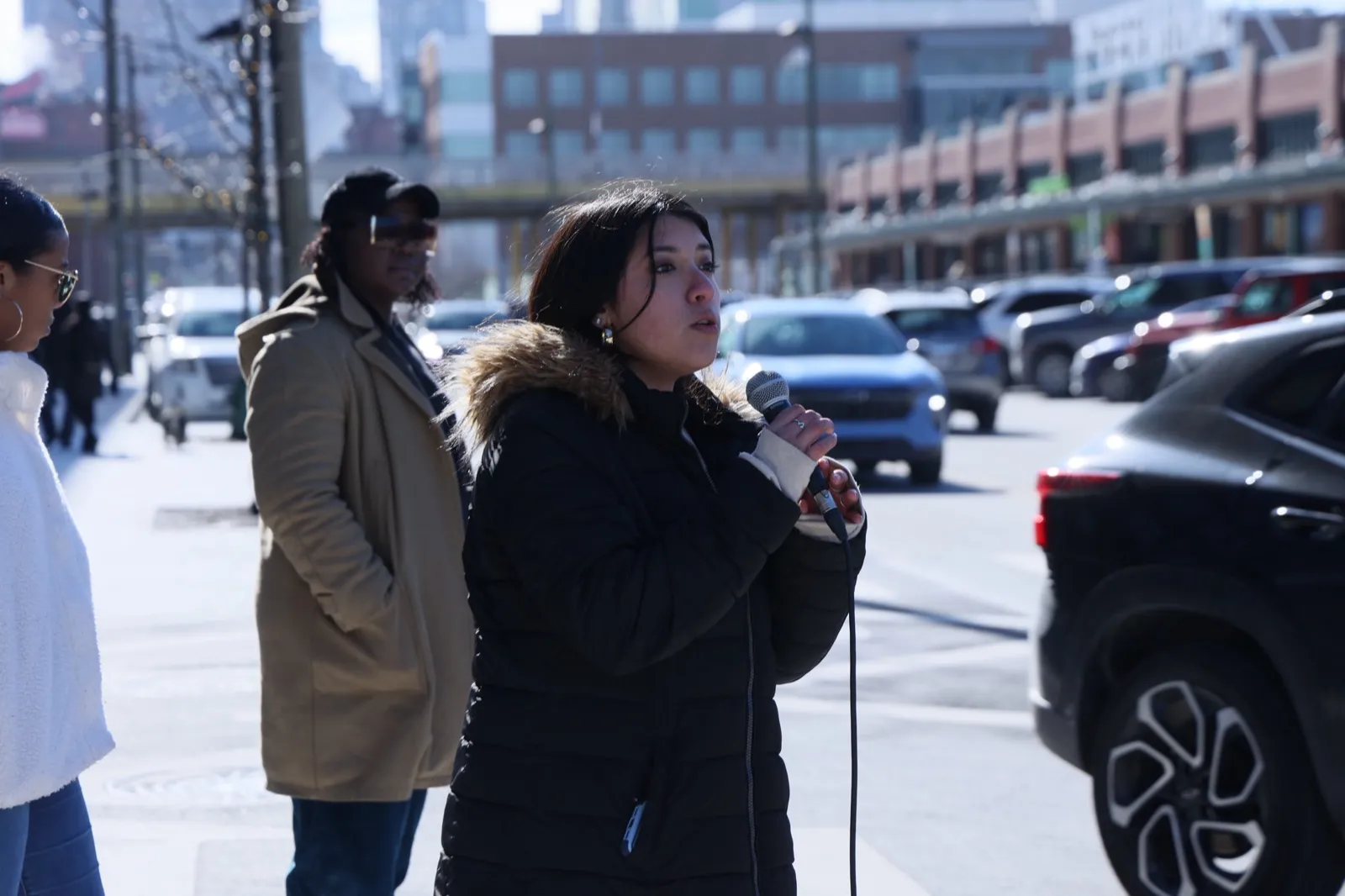 Victoria preaching on a city street