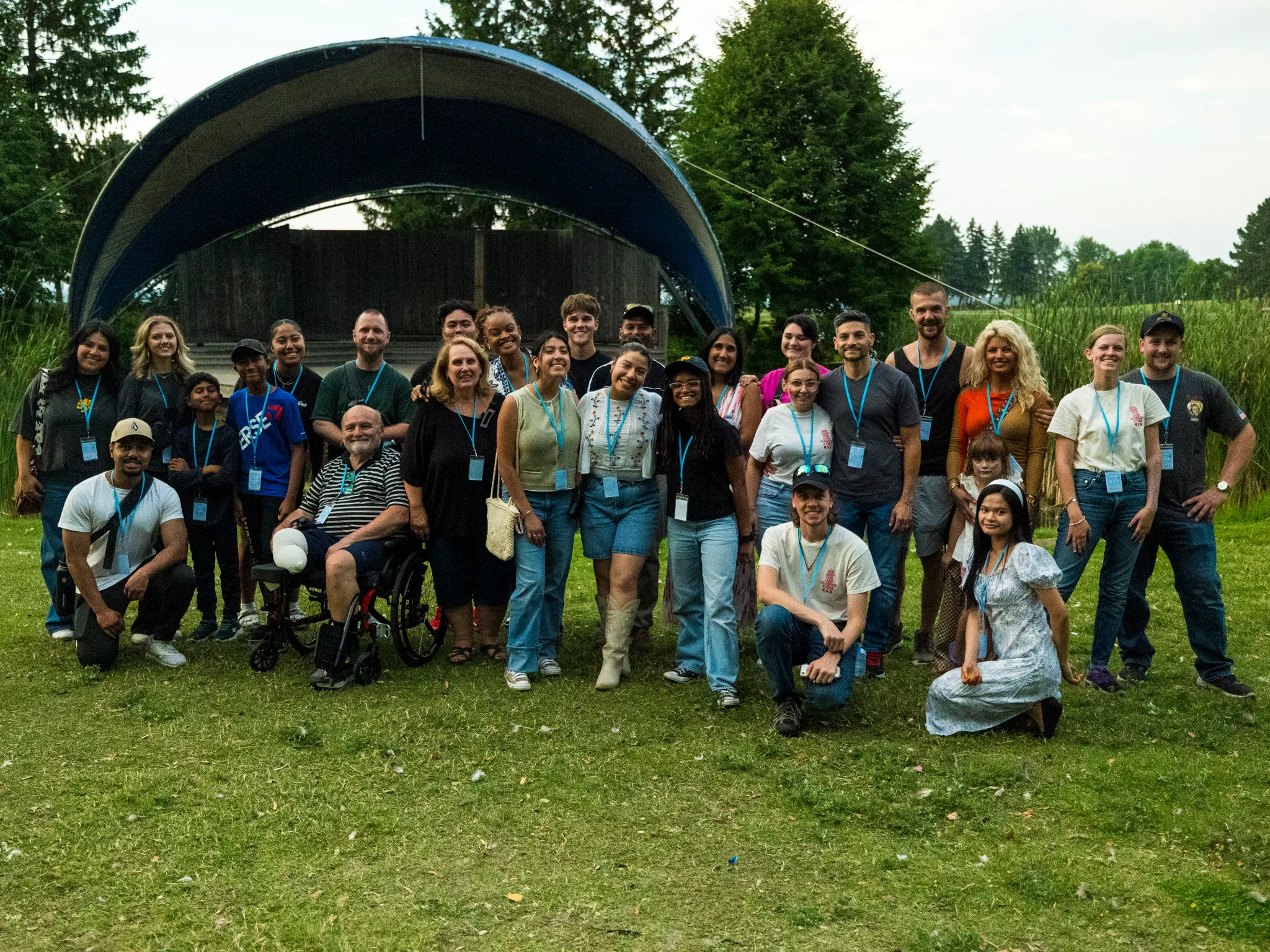 The Awakening Victory team gathered at an outdoor revival